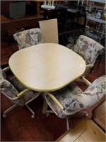 Dining table with 4 rolling chairs