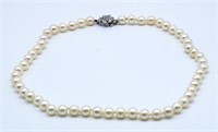 Good pearl necklace with gold & diamond clasp