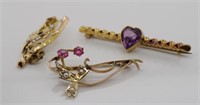 The antique gem set gold brooches