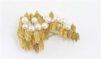 Yellow gold and pearl brooch marked 14K