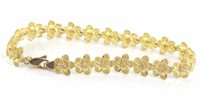 Brushed 9ct yellow gold and cz flower bracelet