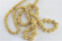 Long vintage carved bead necklace