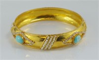 21ct yellow gold gem set bangle