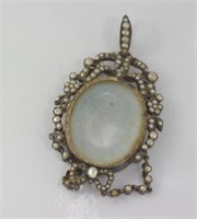 Antique silver & seed pearl day-night locket