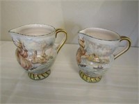 2 Handpainted Signed Pitchers(1 chipped)