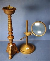 Brass magnifying glass on stand