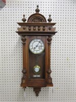 ANTIQUE CARVED WALL CLOCK WITH KEY AND PENDULUM