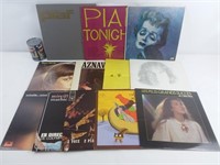 12 vinyles dont 3 Piaf ,Aznavour et Céline Dion