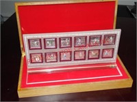 12 CHINESE RABBIT COINS IN WOOD DISPLAY BOX