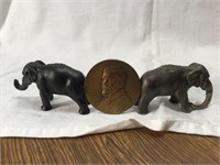 Advertisement elephants and coin