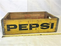 Vintage yellow Pepsi crate.