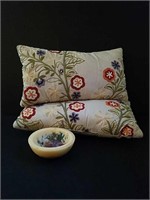 Floral Pillows and Wax Bowl.