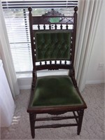 Eastlake chair with green cloth