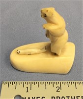 2.5" Ivory carving of a bear attacking a seal - mo