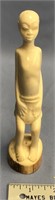 6.5" Fossilized ivory carving of a young boy - ver