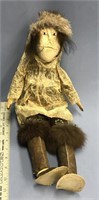 A very old Alaskan Native doll made of hide with s