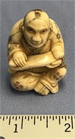 2" Fossilized ivory netsuke with delicate detailed