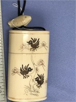 3" Bone box with bird scrimshaw made into a pendan