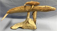 14" X 23.5" Fossilized bone carving of a whale and