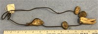 An American Indian old necklace with fossilized an