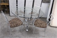11- METAL GLASS TOP TABLE AND 4 CHAIRS