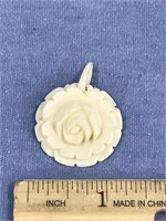 Ivory carved flower pendent, approx. 1 1/4" diamet
