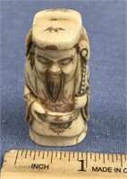 2" colored scrimmed ivory netsuke, of an oriental