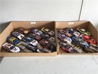 2 boxes of Nascar collectible cars.