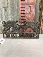 Welcome cast iron sign