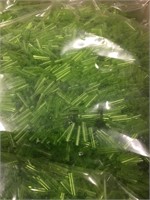 Toho 9 mm transparent light green bugle beads