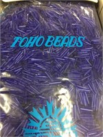 Toho 12 mm transparent cobalt bugle beads