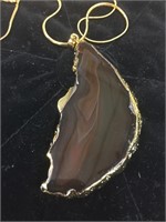 Agate pendant wrapped in gold with gold chain