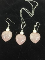 Heart shaped rose quartz earrings and pendant on