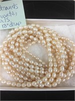 Four strands of saltwater pearls 13 inch drop