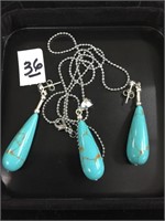 Turquoise pendant and earrings on silver chain