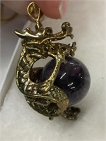Amethyst stone with gold dragon on gold chain