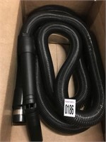 STRETCHED VACUUM HOSE WITH CURVED END