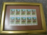 Ten 25¢ stamps, brass letter opener, wooden oak
