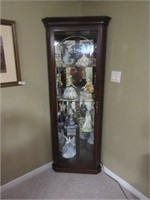 Corner curio cabinet with light