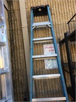 Blue and metal ladder