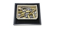 Box of .50 Cal. brass cartridges and bullet for