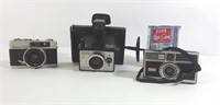 3 caméras photo: Kodac, Konica et Polaroid