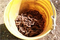 bucket of misc. chain parts