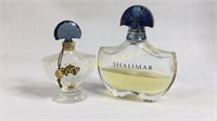 Two Guerlain perfume bottles