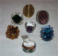 7 gold or silver tone rings with stones or solid