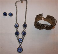 a Monet 16" silver pendant with blue stones and