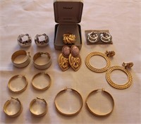 8 pairs gold tone Monet earrings, a slide