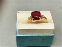 10k ladies ring with red stone