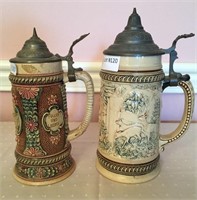 2 Unmatched pottery stein - relief, huntsman,