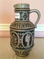 Stoneware pitcher, relief, 6 cameo, musicians,